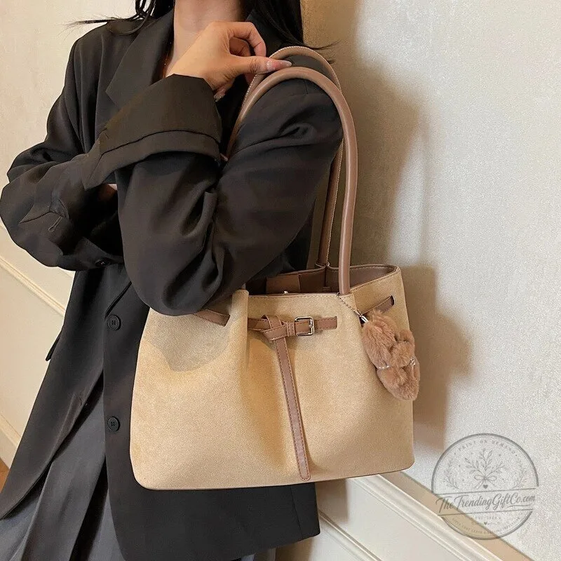 Elegant Beige Faux Suede Shoulder Bag with Adjustable Strap and Charm 1 Elegant Beige Faux Suede Shoulder Bag with Adjustable Strap and Charm